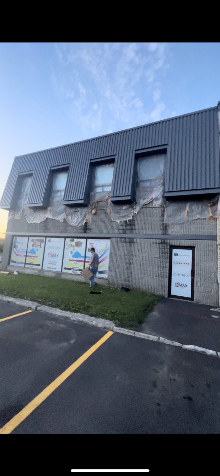 exterior building being sprayed by a gun in montreal est